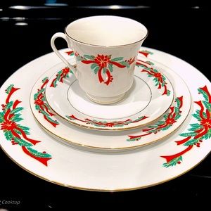 “Poinsettia and Ribbons” Fine China 12 plus place setting
